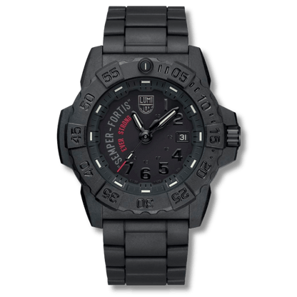 A black tactical-style LUMINOX WATCH שעון לומינוקס analog watch with a matching black metal link bracelet, featuring a dark dial with green, orange, and white markings and the text 'SEMPER FORTIS' and 'EVER STRON